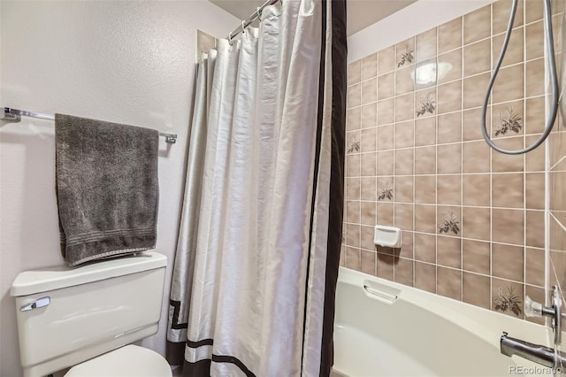 full bathroom featuring toilet and shower / bath combination with curtain