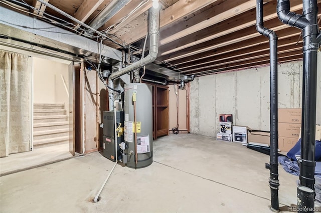 unfinished basement with stairway and gas water heater