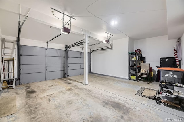 garage featuring a garage door opener