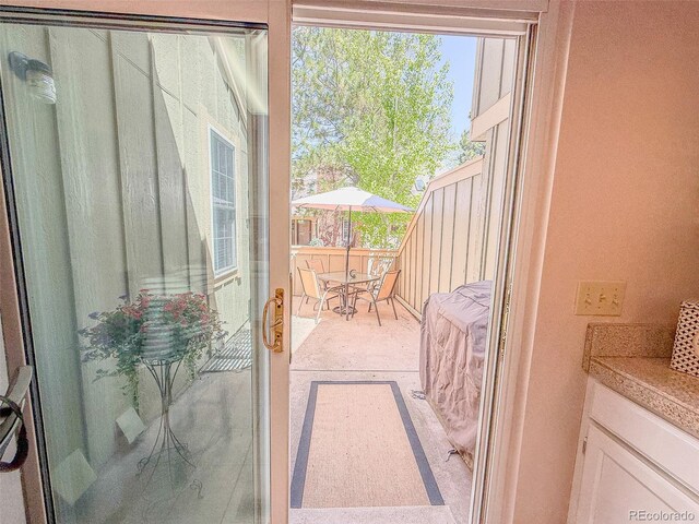 doorway to outside with plenty of natural light