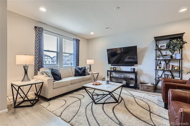 living room featuring light hardwood / wood-style flooring