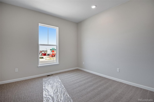 3394 N Grand Baker Ct, Aurora, CO 80019 - unfurnished room featuring carpet flooring and recessed lighting