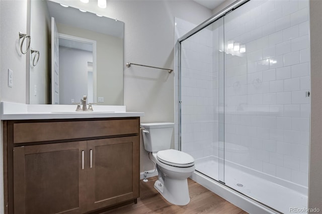 3394 N Grand Baker Ct, Aurora, CO 80019 - full bath featuring wood finished floors, a stall shower, and vanity