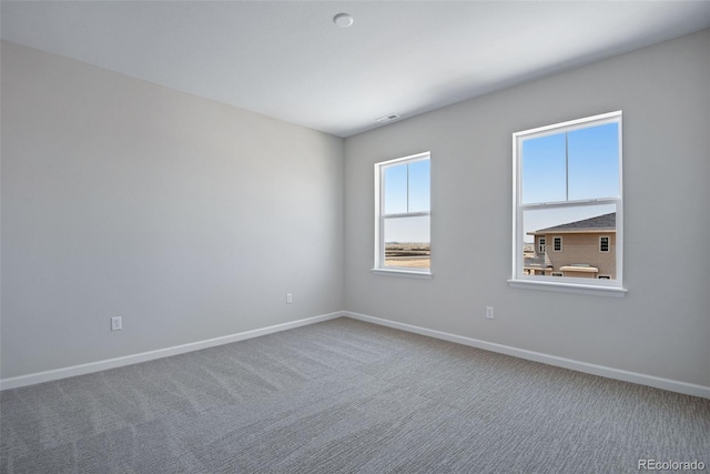 3394 N Grand Baker Ct, Aurora, CO 80019 - carpeted empty room featuring baseboards