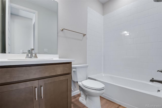 3394 N Grand Baker Ct, Aurora, CO 80019 - full bathroom with vanity, wood finished floors, and tub / shower combination
