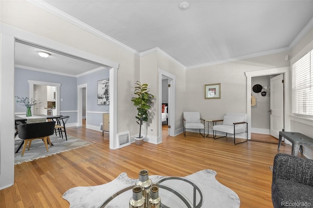 864 Garfield St, Denver, CO 80206 - living room featuring light wood-style floors and ornamental molding
