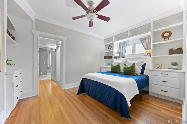 864 Garfield St, Denver, CO 80206 - bedroom featuring ornamental molding, light wood finished floors, and a ceiling fan