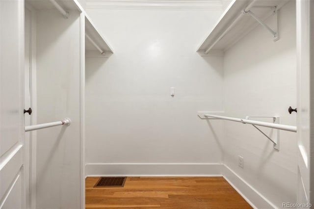 864 Garfield St, Denver, CO 80206 - walk in closet with wood finished floors