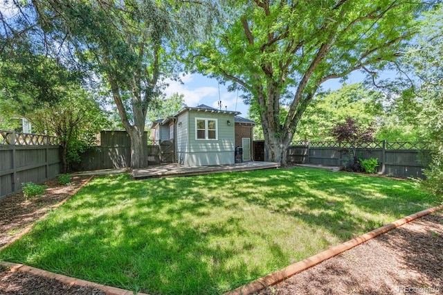 864 Garfield St, Denver, CO 80206 - rear view of property featuring a fenced backyard and a wooden deck