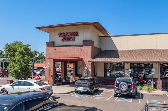 864 Garfield St, Denver, CO 80206 - view of commercial property featuring uncovered parking