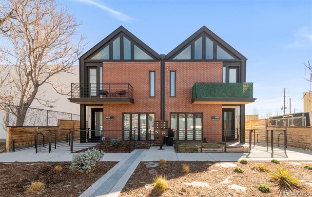 4232 Jason St Unit 2, Denver, CO 80211 - view of front of house featuring a balcony and brick siding