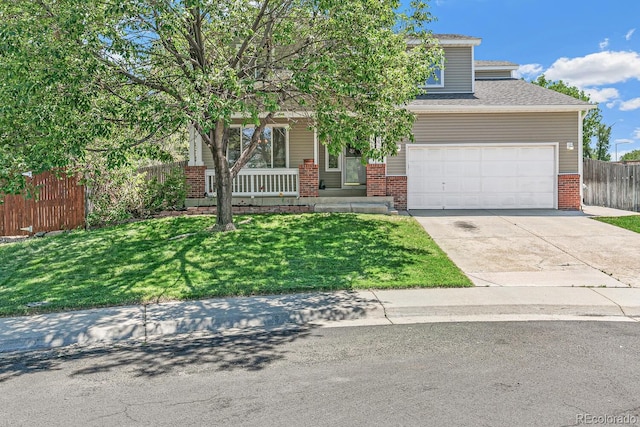 obstructed view of property featuring a porch, a garage, and a front lawn