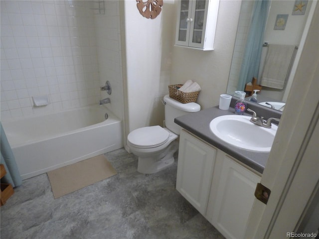 full bathroom with toilet, tiled shower / bath, and vanity