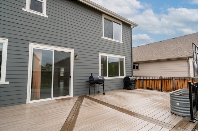 wooden terrace with grilling area