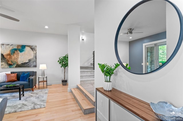 2745 Java Ct, Denver, CO 80211 - corridor with light wood finished floors, stairs, and recessed lighting