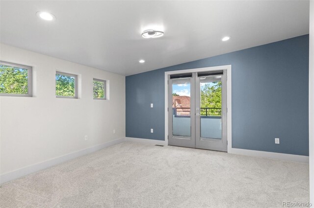 2745 Java Ct, Denver, CO 80211 - spare room featuring plenty of natural light, recessed lighting, and light carpet