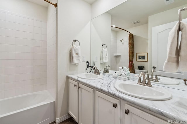 14938 Vienna Cir, Parker, CO 80134 - bathroom with double vanity and shower / bath combination with curtain