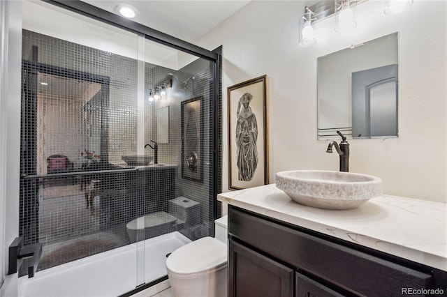 14938 Vienna Cir, Parker, CO 80134 - bathroom with toilet, vanity, and a shower stall
