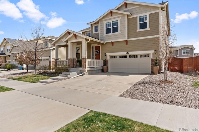 14938 Vienna Cir, Parker, CO 80134 - craftsman-style house featuring a garage, driveway, covered porch, stone siding, and a residential view