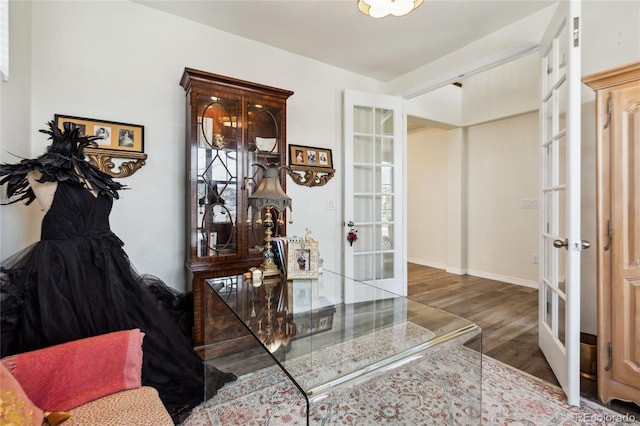 14938 Vienna Cir, Parker, CO 80134 - entryway with french doors, wood finished floors, and baseboards