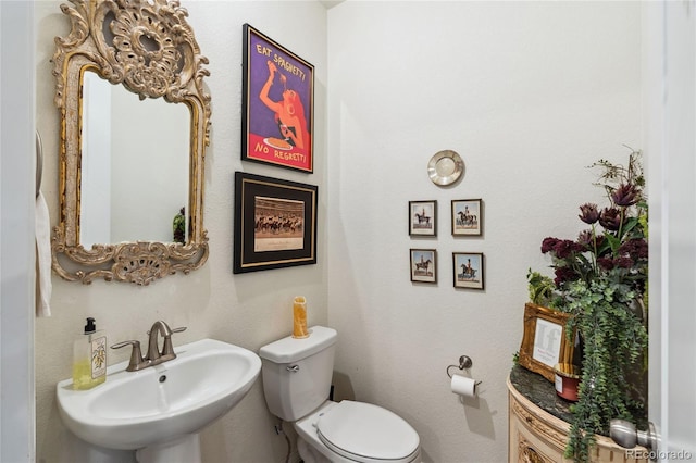 14938 Vienna Cir, Parker, CO 80134 - half bathroom with a sink and toilet