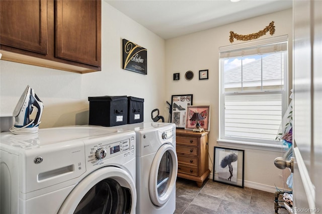 14938 Vienna Cir, Parker, CO 80134 - laundry area featuring washing machine and clothes dryer, cabinet space, and baseboards