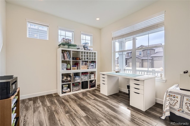 home office with recessed lighting, baseboards, and wood finished floors