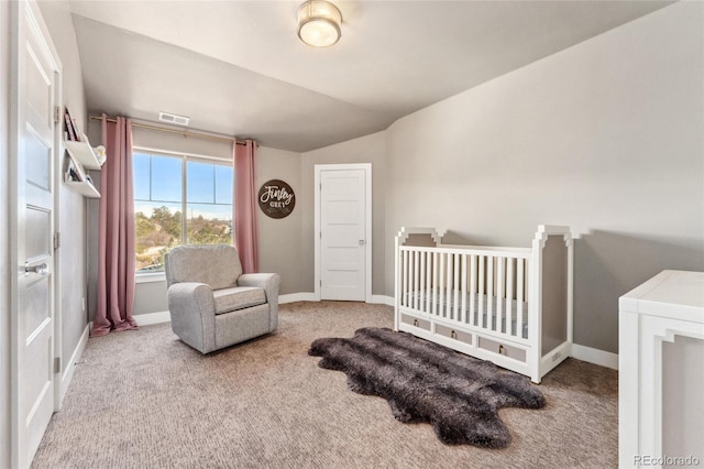 bedroom with vaulted ceiling and carpet