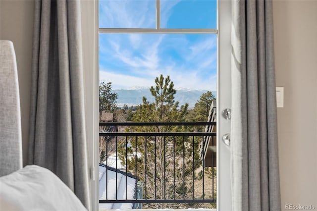 balcony featuring a mountain view