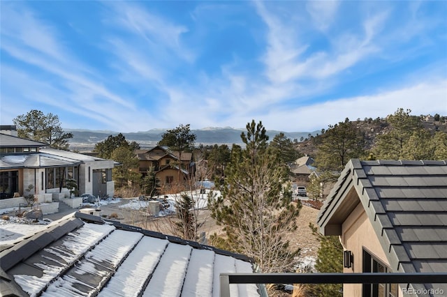 balcony featuring a mountain view