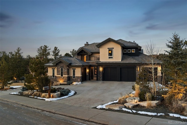 view of front of property with a garage