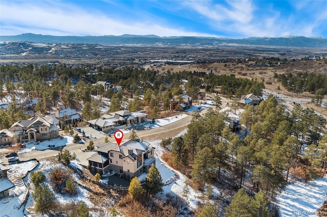 bird's eye view with a mountain view