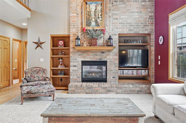 5683 Fig Way, Arvada, CO 80002 - living room with a brick fireplace