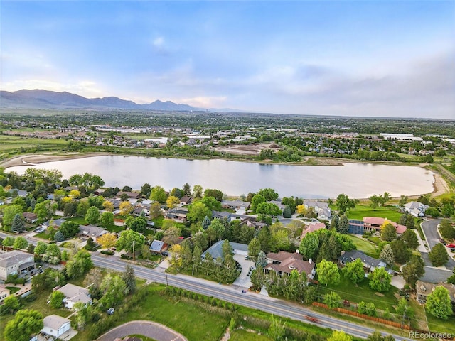 5683 Fig Way, Arvada, CO 80002 - aerial view of residential area featuring a water and mountain view