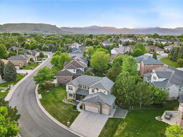 5683 Fig Way, Arvada, CO 80002 - aerial perspective of suburban area with mountains