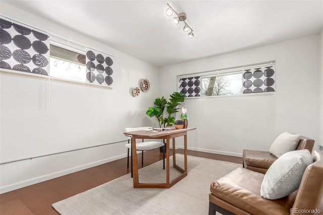 office area with baseboards and a healthy amount of sunlight