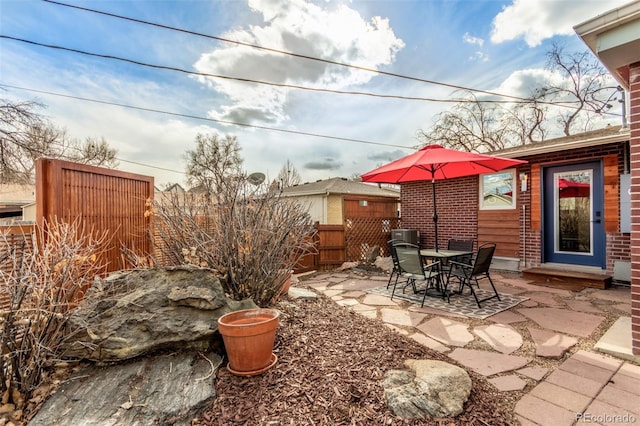 view of patio with fence