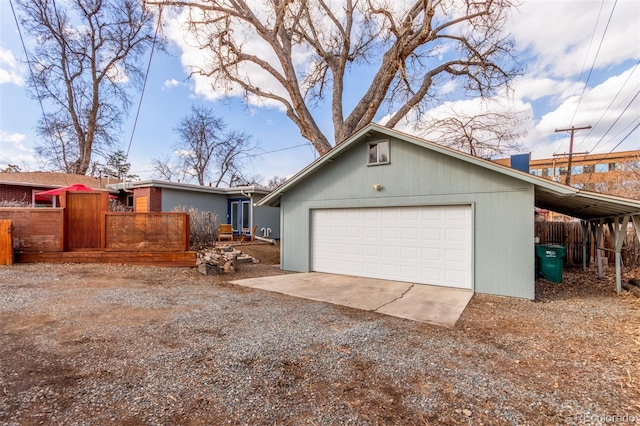 exterior space featuring driveway and an attached garage