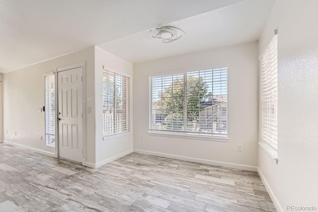 entrance foyer featuring light wood-type flooring