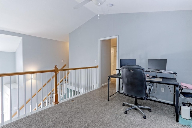 office space with carpet and vaulted ceiling