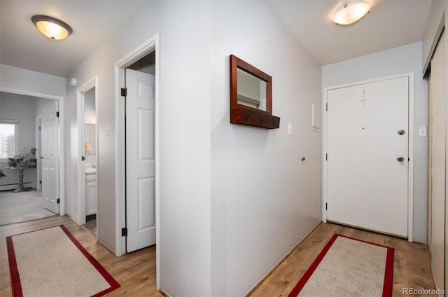 hall featuring light wood-type flooring