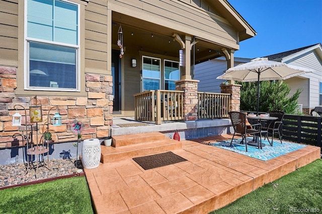 2012 Sagerock Dr, Castle Pines, CO 80108 - porch with outdoor dining area