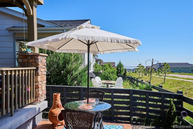 2012 Sagerock Dr, Castle Pines, CO 80108 - balcony with outdoor dining space