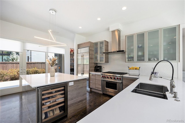 3057 S University Cir, Englewood, CO 80113 - kitchen featuring wine cooler, wall chimney exhaust hood, high end appliances, light countertops, and modern cabinets