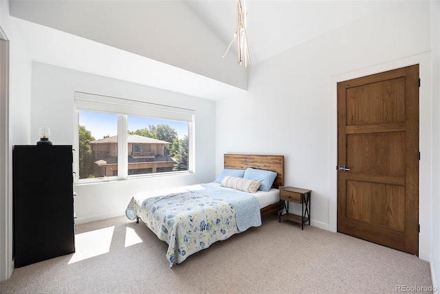 3057 S University Cir, Englewood, CO 80113 - carpeted bedroom featuring baseboards and high vaulted ceiling