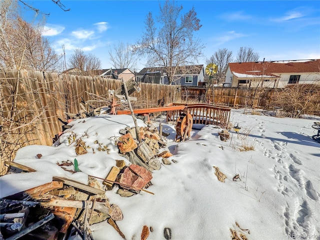 view of yard layered in snow