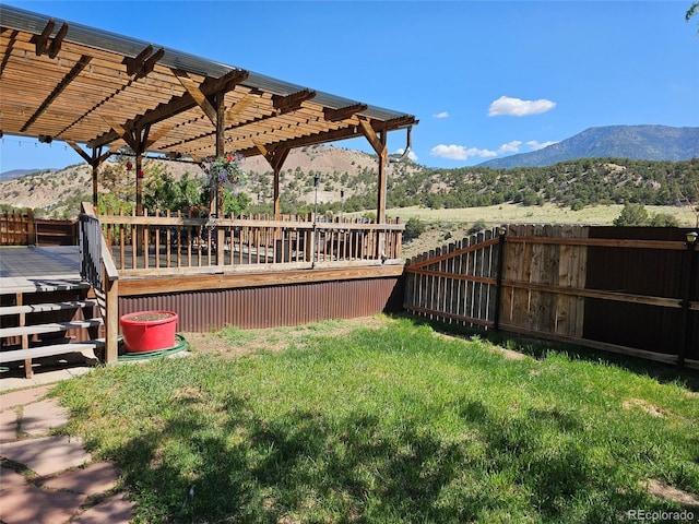 11679 US Highway 50, Howard, CO 81233 - view of yard featuring a deck with mountain view and a pergola