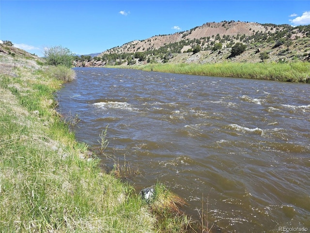 11679 US Highway 50, Howard, CO 81233 - water view with a mountain backdrop