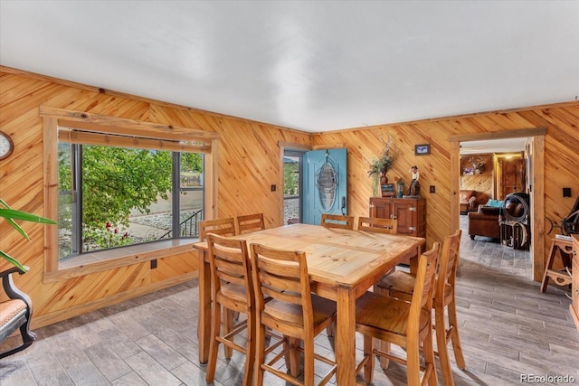 11679 US Highway 50, Howard, CO 81233 - dining room featuring wood walls and wood finished floors
