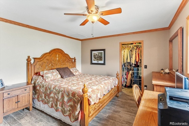 11679 US Highway 50, Howard, CO 81233 - bedroom with ornamental molding, a walk in closet, light wood finished floors, a closet, and ceiling fan